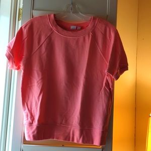 GAP xs orange short sleeve top with sweatshirt material inside.